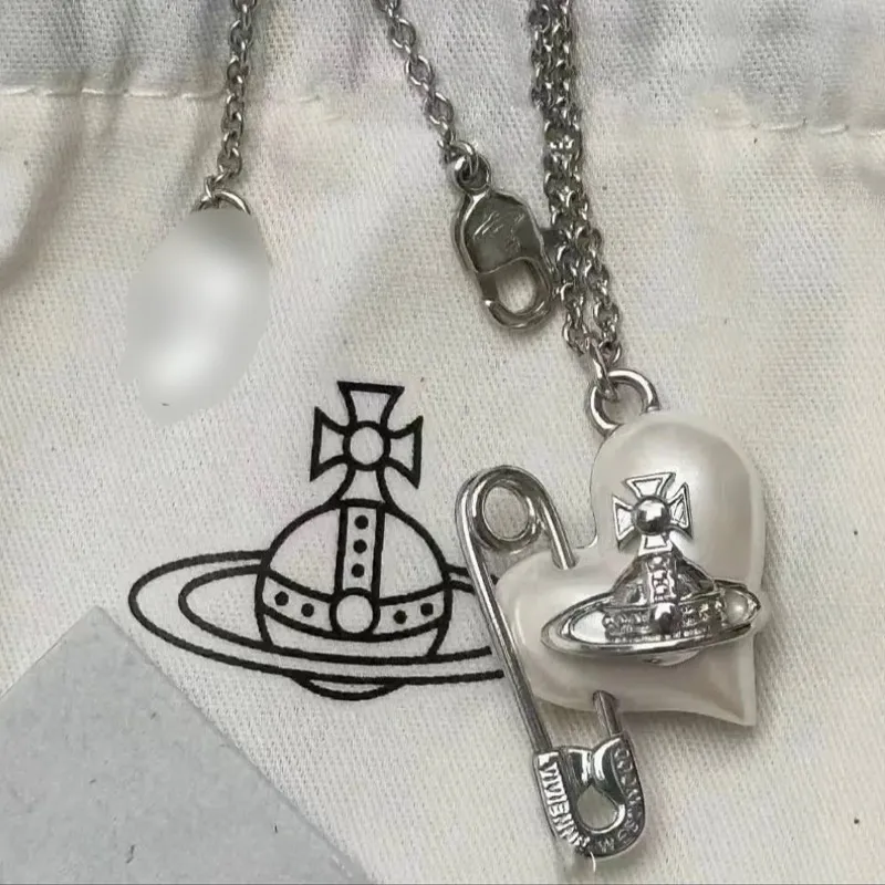 گردنبند مدل ویوین وست وود و قلب سنجاق گردنبند مدل ویوین وست وود و قلب سنجاق